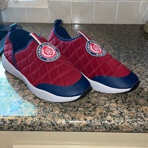 Mens Tommy Hilfiger slip on athletic shoes.